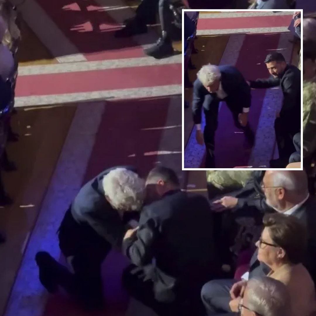 Sean Penn Speaks With Zelensky Between the Rows During a Concert